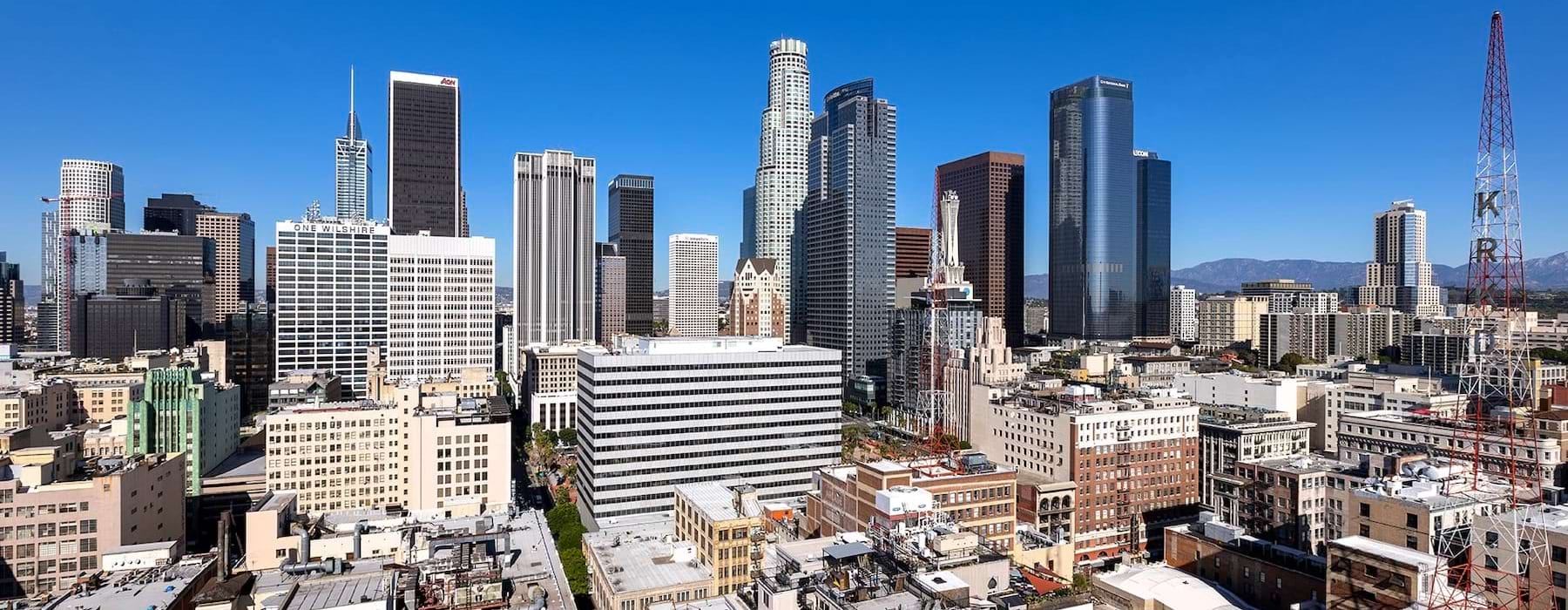 a cityscape under a blue sky