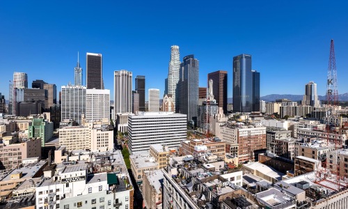 a cityscape under a blue sky