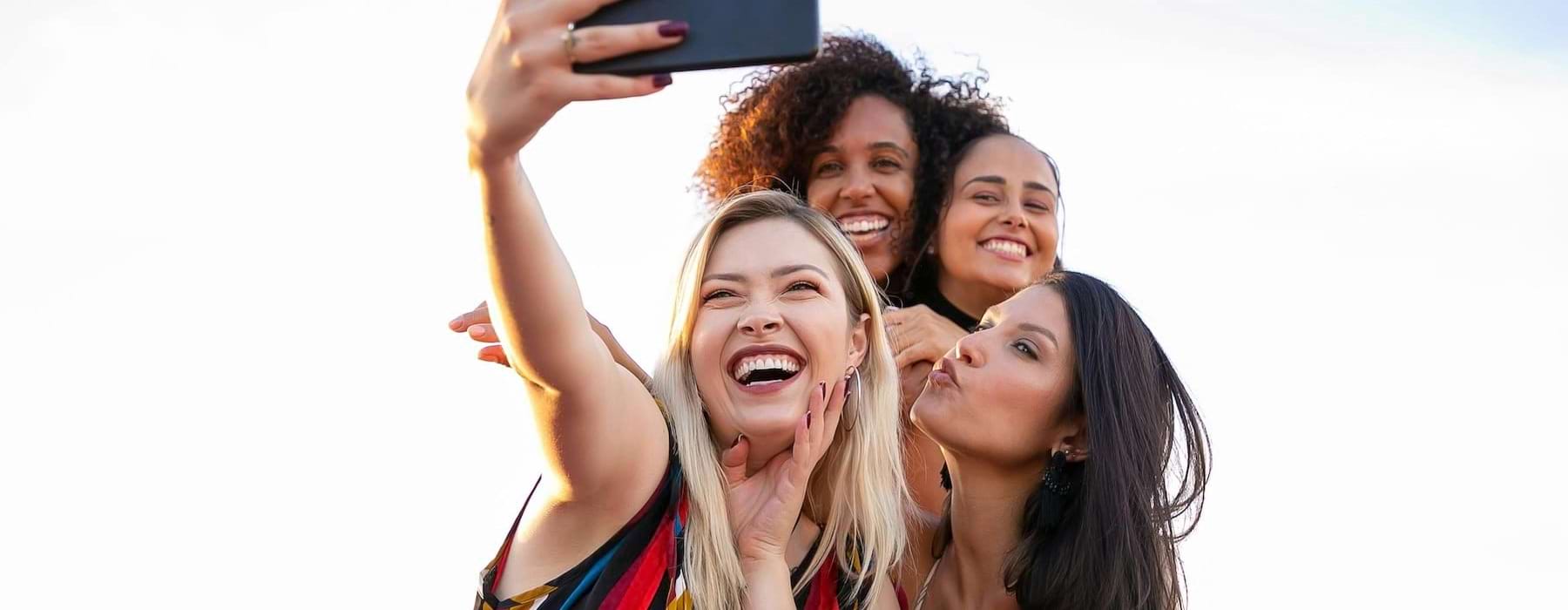 a group of women posing for a picture