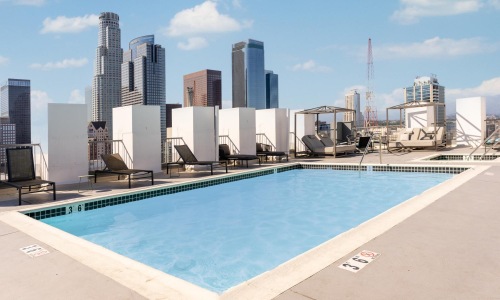 a pool in front of a city